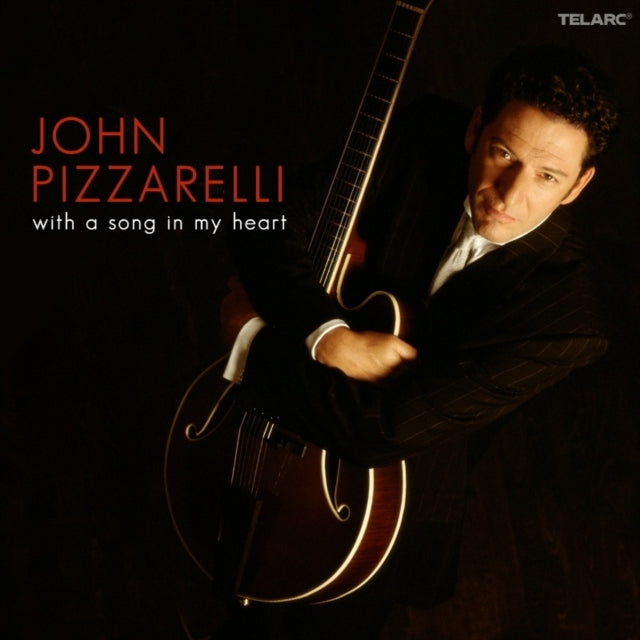 This CD is brand new.Format: CDMusic Style: Folk RockThis item's title is: With A Song In My HeartArtist: John PizzarelliBarcode: 089408367625Release Date: 8/19/2008
